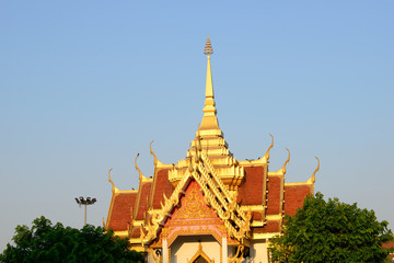 Fototapeta premium Golden art sculpture at Tung Sri Muang park in Ubon Ratchathani province, Thailand