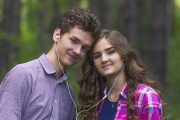 Portrait of happy teenage couple