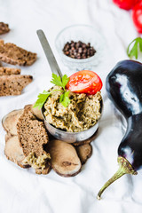 Traditional arabian eggplant dip baba ganoush with herbs and tom