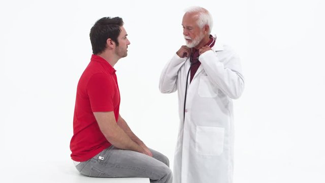 Doctor checking patient's chest with stethoscope