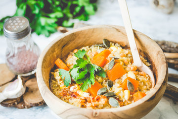 red lentil soup with corn, pumpkin, paprika and herbs, tinting