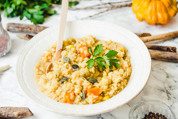 soup of red lentils with pumpkin and corn, vegan, autumn dish