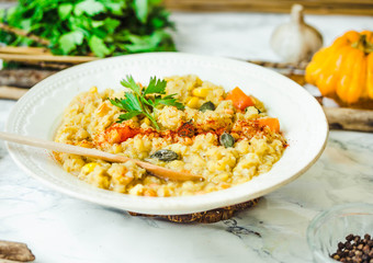soup of red lentils with pumpkin and corn, vegan, autumn dish
