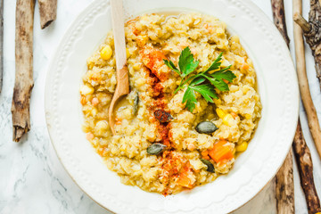 soup of red lentils with pumpkin and corn, vegan, autumn dish,cl