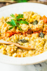 soup of red lentils with pumpkin and corn, vegan, autumn dish,cl