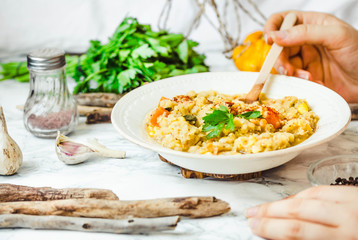 soup of red lentils with pumpkin and corn, vegan, eating process