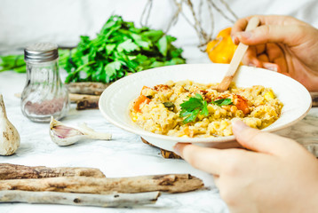soup of red lentils with pumpkin and corn, vegan, eating process