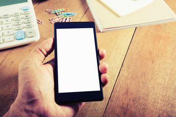 Hand man holding smart phone vintage style