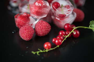 Frozen berries on wooden table