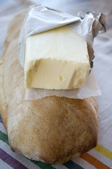pat of butter on a bread loaf