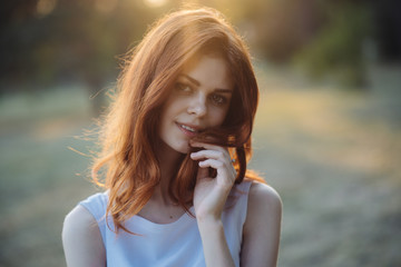 
woman in a white dress park

