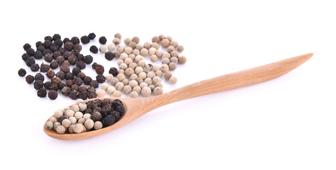 Black pepper, white pepper wooden spoon