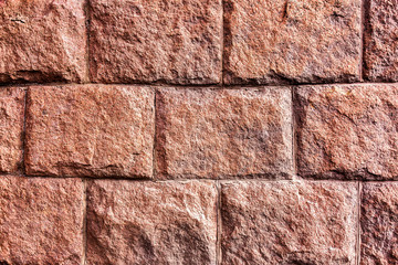 The wall in the form of decorative bricks with large texture as background