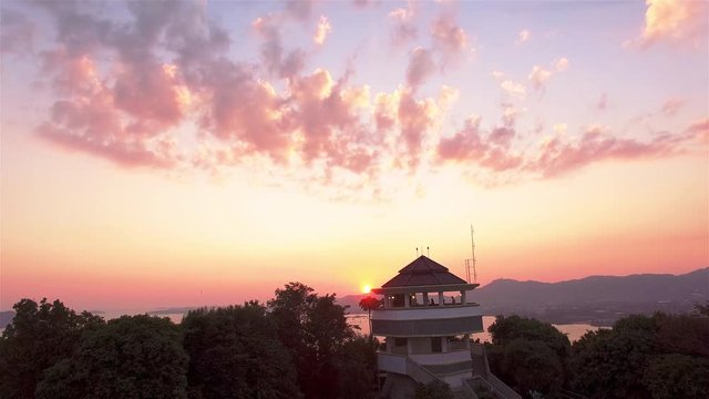 aerial photography on khao khad view point Phuket.sunset at Khao Khad view point the sun going down to the roof view point building Khao Khad view point can  see around Phuket island 360 degree