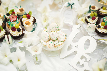 French sweet colorful macarons background, close up