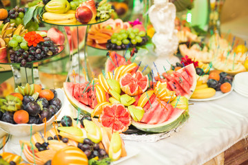 Authentic buffet, assorted fresh fruits, berries and citrus. Preparation for design creative menu