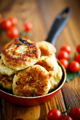 fried chicken cutlet with cherry tomatoes