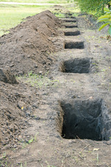 Fence foundation pits, vertical