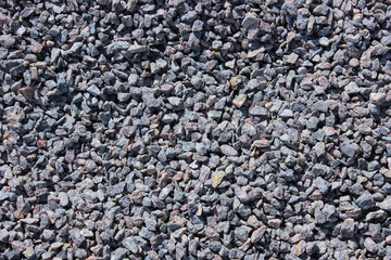 granular surface background with small grey stones