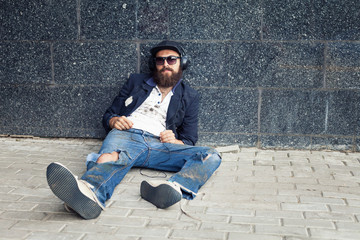 Fototapeta premium Vagrant in earphones