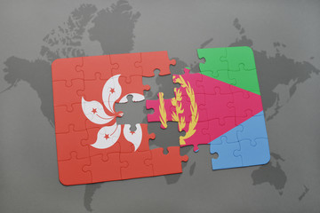 puzzle with the national flag of hong kong and eritrea on a world map background.