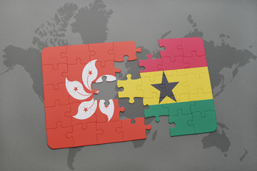 puzzle with the national flag of hong kong and ghana on a world map background.