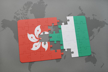 puzzle with the national flag of hong kong and nigeria on a world map background.