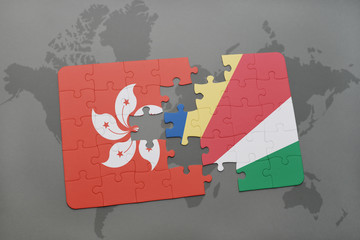 puzzle with the national flag of hong kong and seychelles on a world map background.