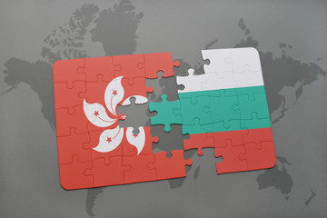 puzzle with the national flag of hong kong and bulgaria on a world map background.