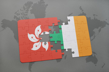 puzzle with the national flag of hong kong and ireland on a world map background.
