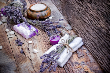 Obraz na płótnie Canvas Spa treatment - lavender soap, scented salt and spa stones
