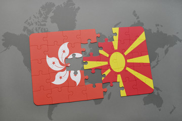 puzzle with the national flag of hong kong and macedonia on a world map background.