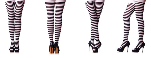 Legs with striped stockings isolated on white