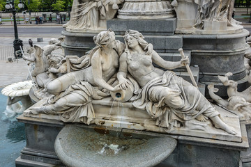 Fototapeta na wymiar Pallas Athena fountain near Parliament Building. Vienna, Austria