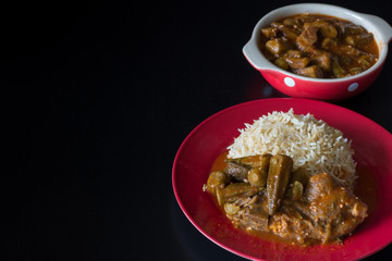 Middle Eastern Bamiya with Rice on Dark Background with Copy Space Horizontal