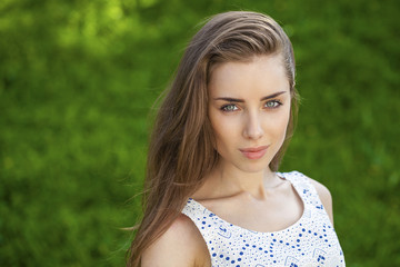 Portrait close up of young beautiful brunette woman