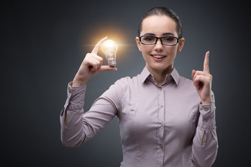 Young businesswoman in bright idea concept