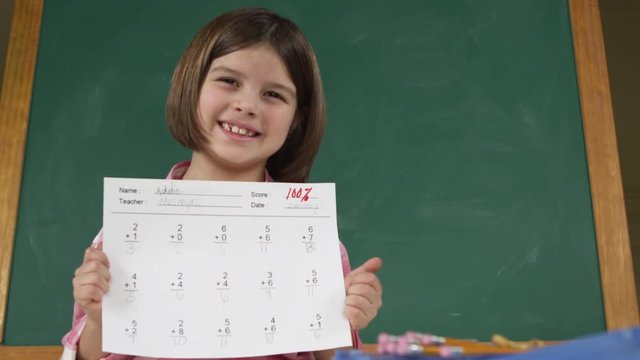 potrait of young girl completing her test