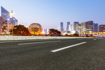 Fototapeta na wymiar new asphalt road and the beautiful Cityscape in hangzhou
