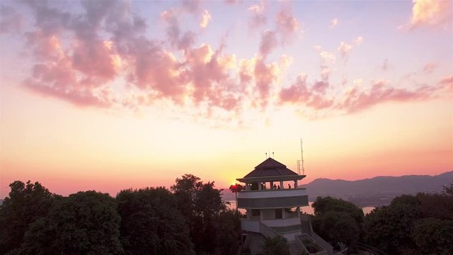 aerial photography on khao khad view point Phuket
sunset at Khao Khad view point the sun going down to the roof view point building Khao Khad view point can  see around Phuket island 360 degree
