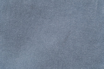 Fototapeta na wymiar fabric pattern texture of denim or blue jeans.