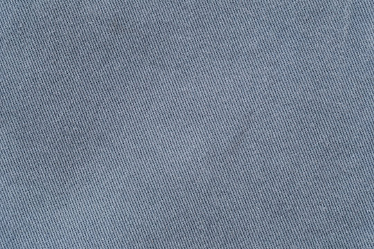 fabric pattern texture of denim or blue jeans.