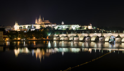 Fototapeta na wymiar Panoramic View of Prague Castle, Charles Bridge and St Vitus Cathedral at night