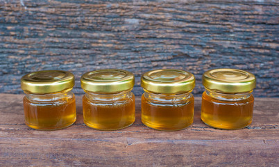 Honey jar on a wooden table