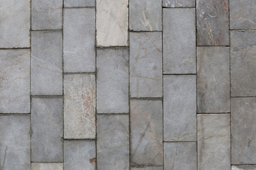 old stone wall Texture in weathered and have natural surfaces.