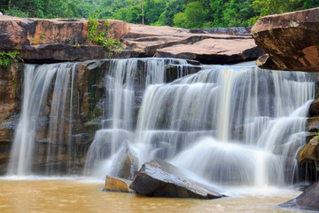 Obraz premium Orange waterfall of Thailand in rainny season
