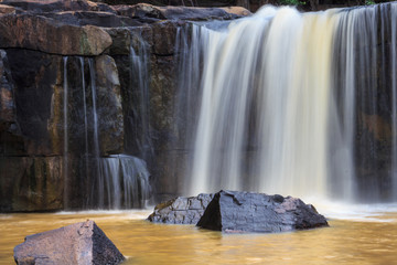 Orange waterfall of Thailand in rainny season