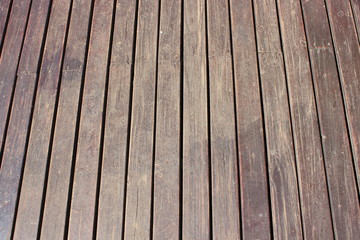 Wooden worn flooring on an outdoor deck