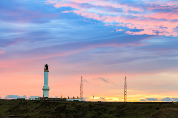 Fototapeta na wymiar Girdle Ness lighthouse During Sunrise in Aberdeen, Scotland UK