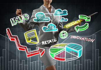 Woman sketching infographs